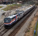 Amtrak Crescent, train #20, leaves Lynchburg and gets a wave from a trail walker 